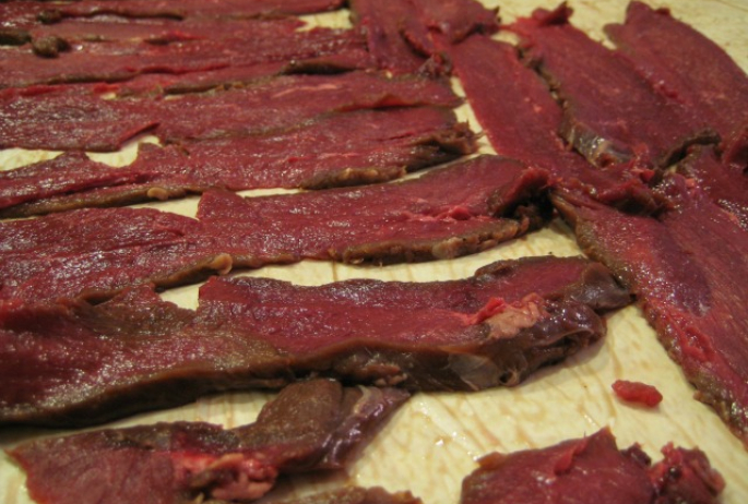 "Venison jerky" by _ Kripptic - venison jerky. Licensed under CC BY 2.0 via Commons - https://commons.wikimedia.org/wiki/File:Venison_jerky.jpg#/media/File:Venison_jerky.jpg