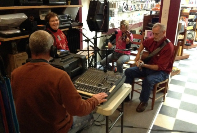 NCPR at Ampersound, broadcasting popular afternoon show, "String Fever"