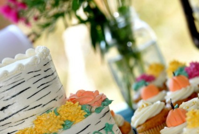 This clever birch bark design on the cake is only one of the many ways we make weddings unique! (photo Kathleen Keck Photography)