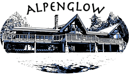 A black and white illustration of the exterior of a large log home with multiple peaked roofs and a large deck with chimney.