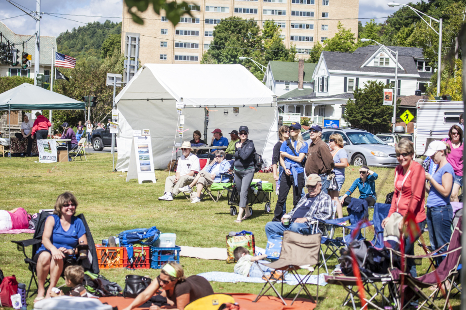 Groups of spectators watch the Adirondack 90-Miler