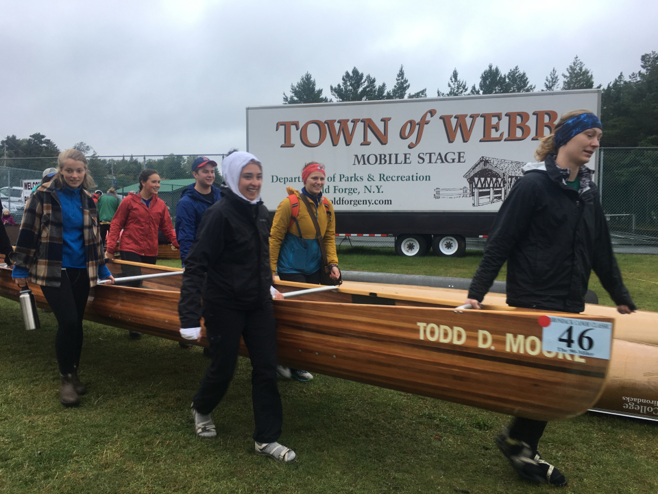 A group of young people competing in the Adirondack 90-Miler preparing to start the race