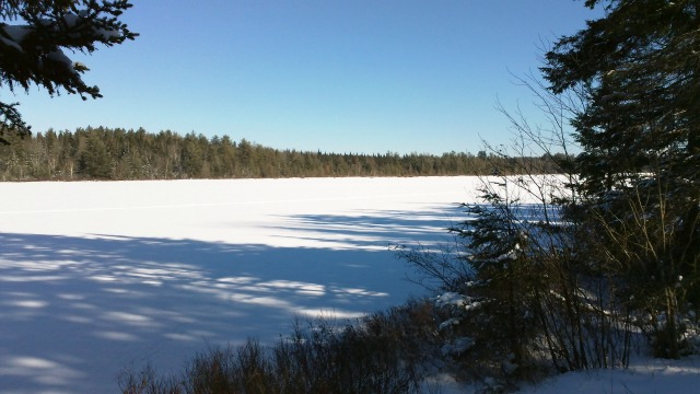 Lake Clear Outlet is the small pond adjoining, visible from the road.