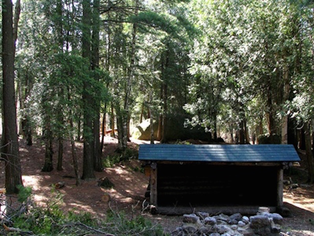 A lean-to now stands where Martha and Fred spent the days and nights of their stay. Courtesy Historic Saranac Lake.