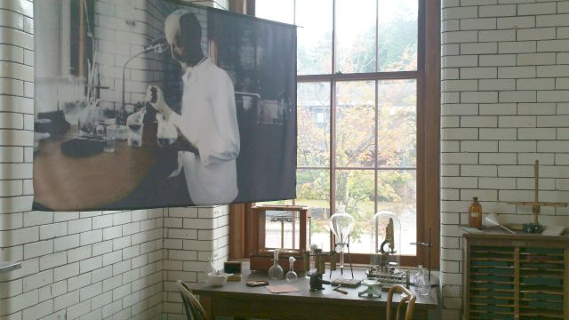 A photo of Dr. Trudeau is displayed in his actual laboratory, restored as a museum.