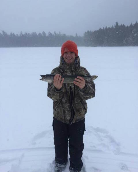 A happy Noah with his pike!