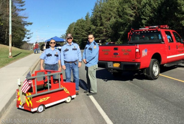 Civic organizations, local businesses, and groups of all kinds sponsor a racer. Here, the Saranac Lake Fire Department. (Photo courtesy SLFD)