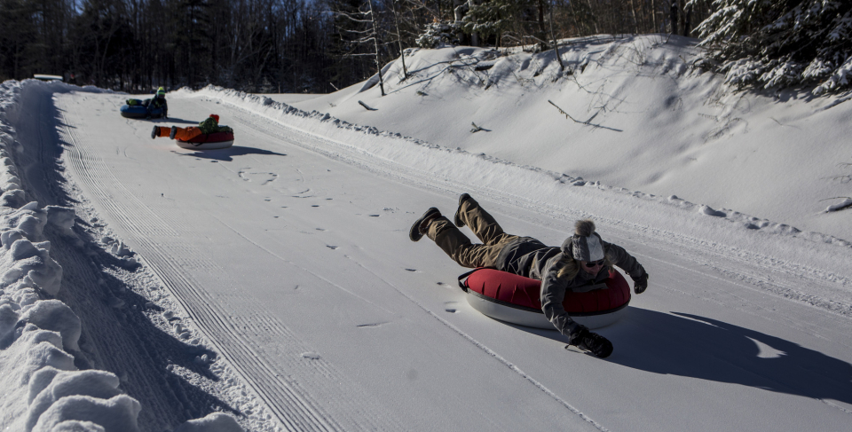 A family tubing at Mount Pisgah.