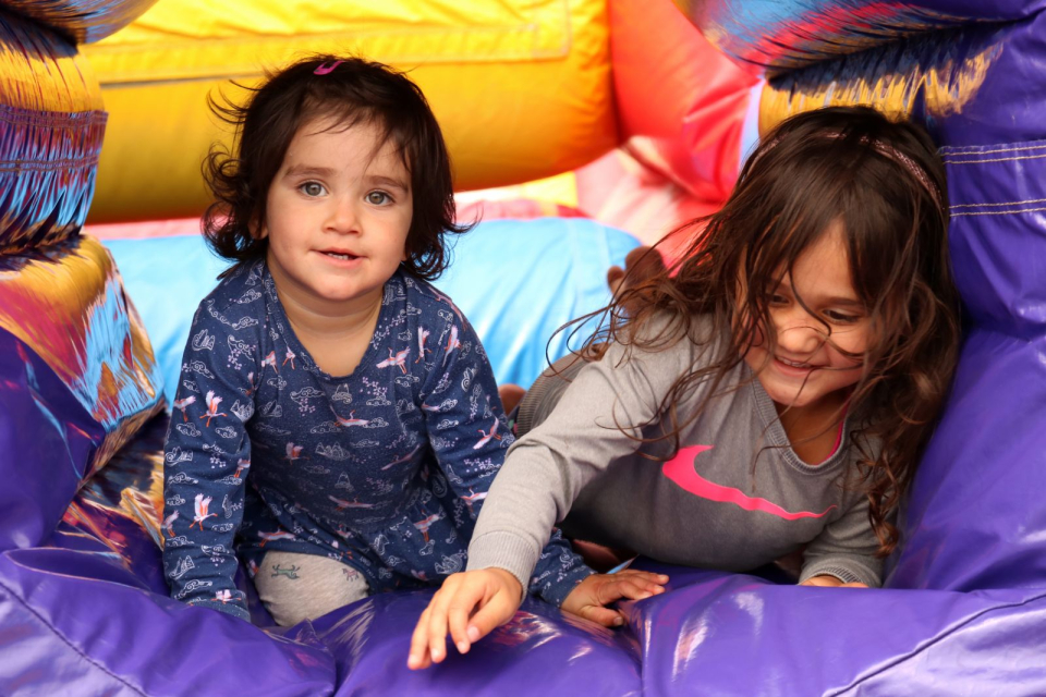 Exploring the bouncy house.