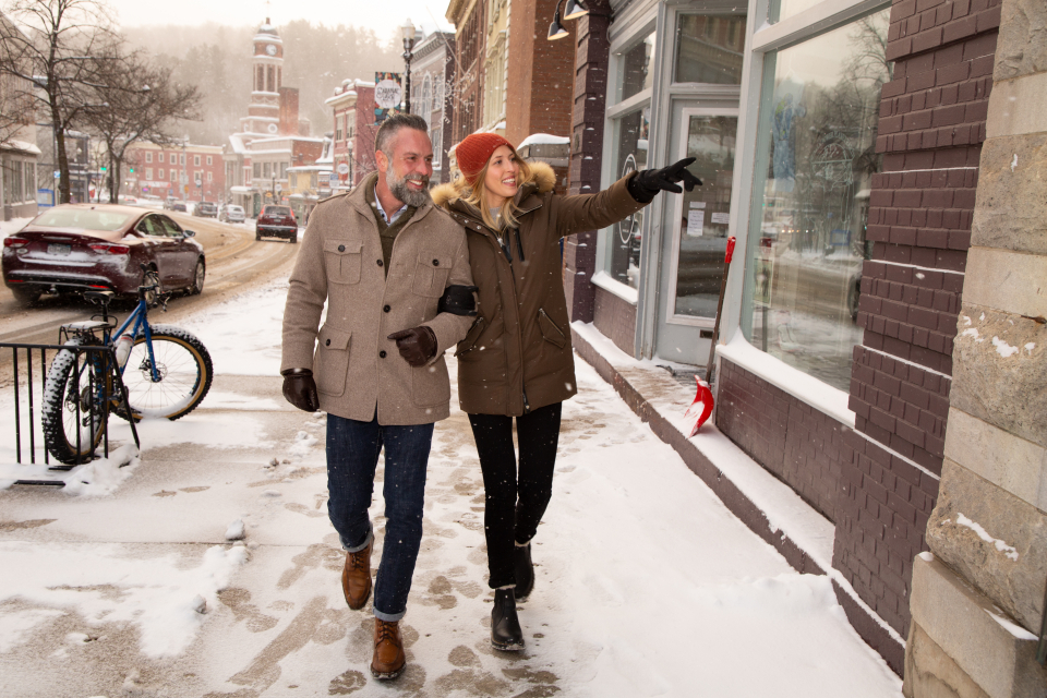 A man and woman shop for the holidays.