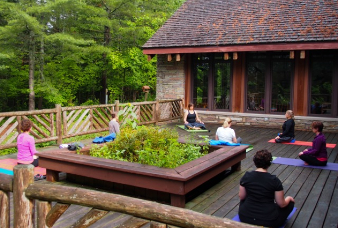 yoga on the deck at the Paul Smiths Visitor Interpretive Center