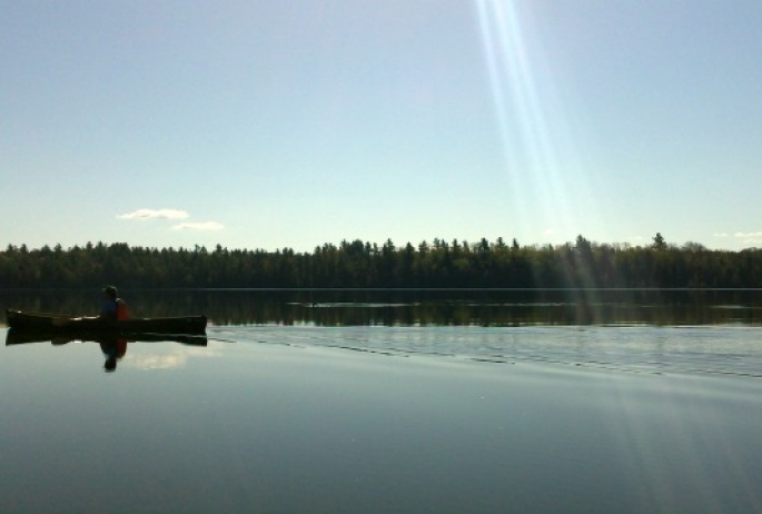 Paddling one of our lakes is to be suspended between earth and sky