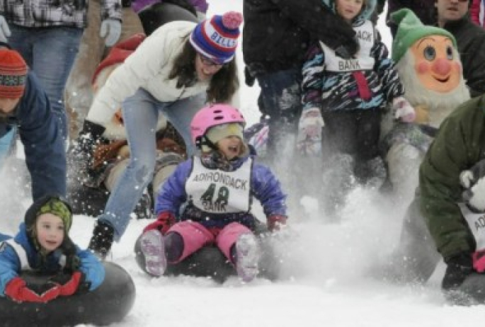 we multiply the fun during Winter Carnival by holding inner tube races