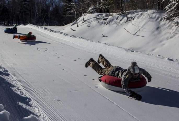 A family tubing at Mount Pisgah.