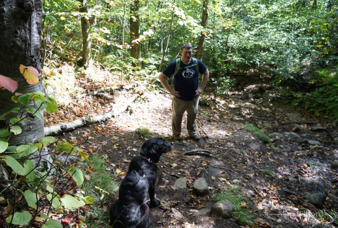 Wren and one of my friends pause to rest during our ascent.