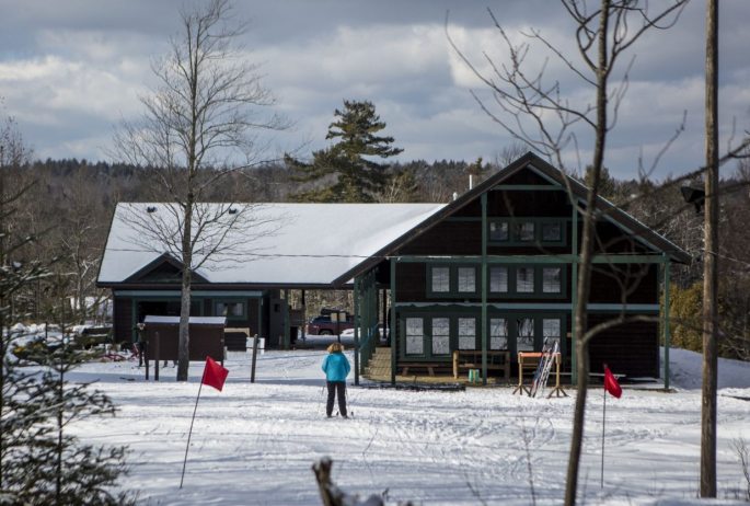 Dewey's new lodge is an oasis of warmth after a day on the trails.