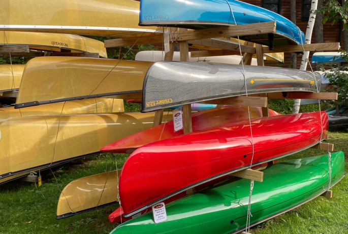 A rack full of canoes.