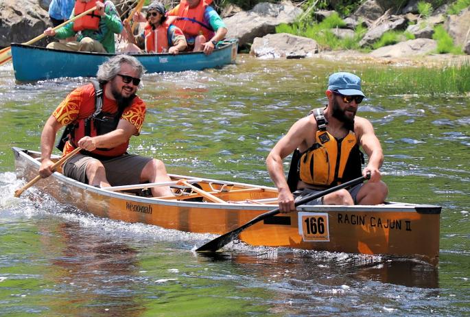 Boats being paddled in a race