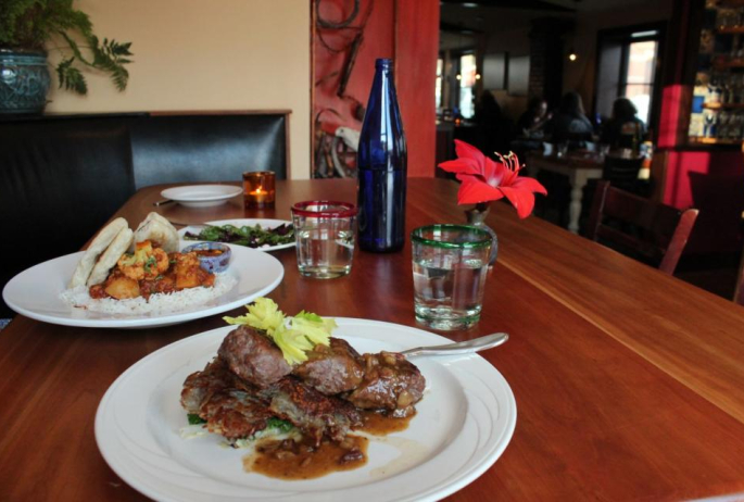 An assortment of entrees on a table.