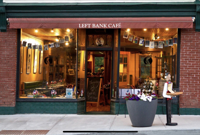 A charming and eclectic window front to a cafe.